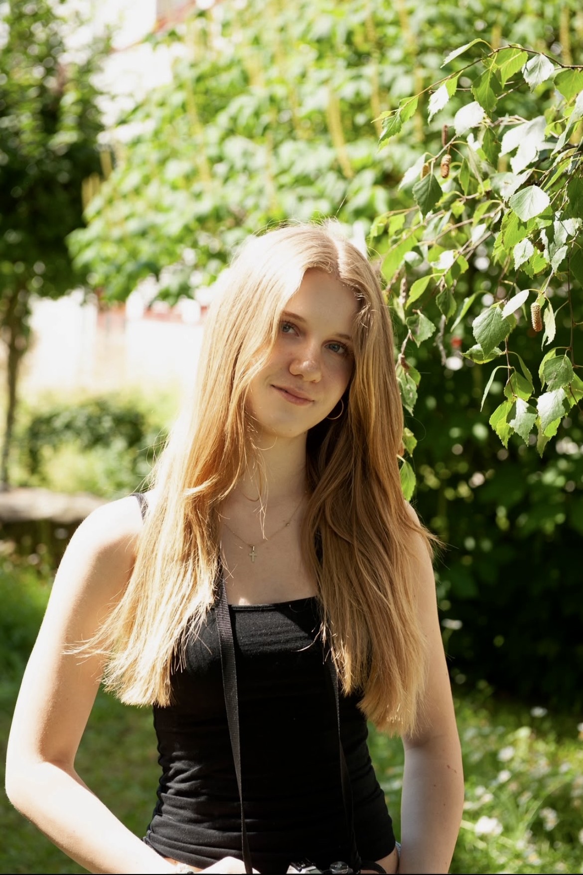 Blondine mit Kamera